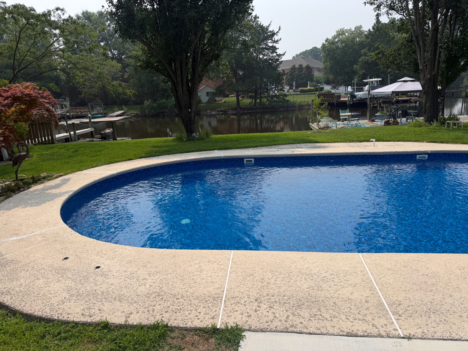 Sparkling pool with freshly washed patio